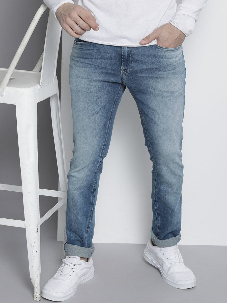 Tommy Hilfiger Men Scanton Slim Fit Mid Rise  Heavy Fade Stretchable Jeans