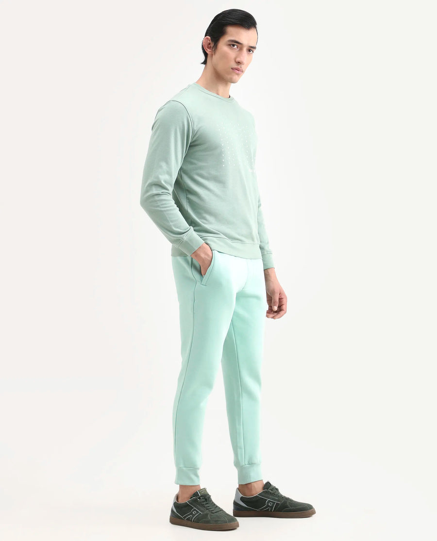 Rare Rabbit Men's Faroe Light Green Cotton Plain Regular Fit Joggers