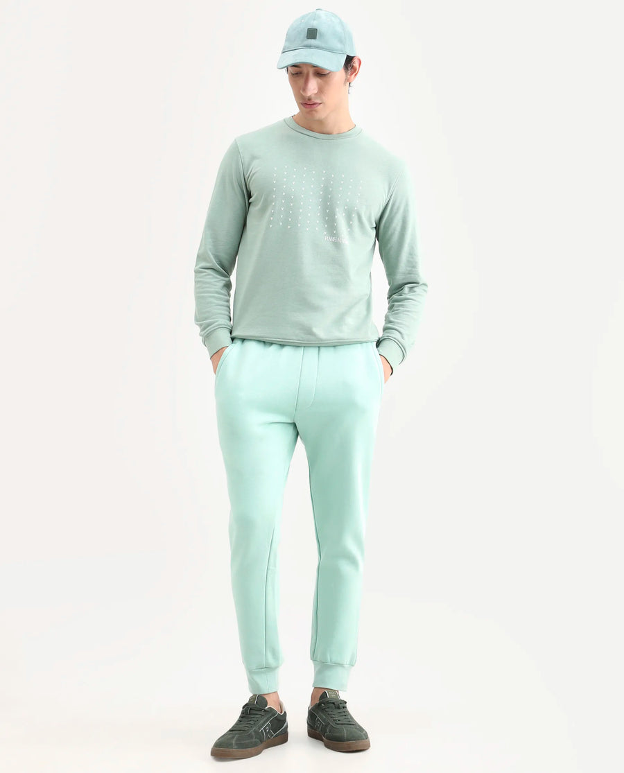 Rare Rabbit Men's Faroe Light Green Cotton Plain Regular Fit Joggers