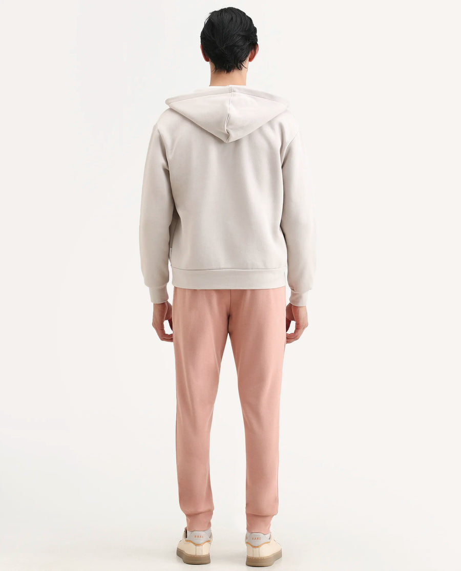 Rare Rabbit Men's Saku Peach Cotton Plain Regular Fit Joggers