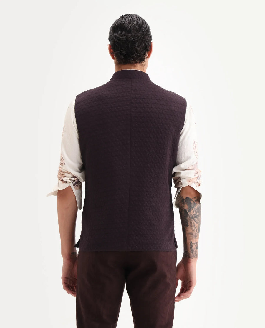 Rare Rabbit Men's Mitzi Dark Maroon Cotton Jacquard Tailored Fit Sleeveless Mandarin Collar Bandhgala Rare Rabbit Men's Lasmos-B1 Beige Viscose Embroidered Regular Fit Sleeveless Mandarin Collar Bandhgala Nehru Jacket