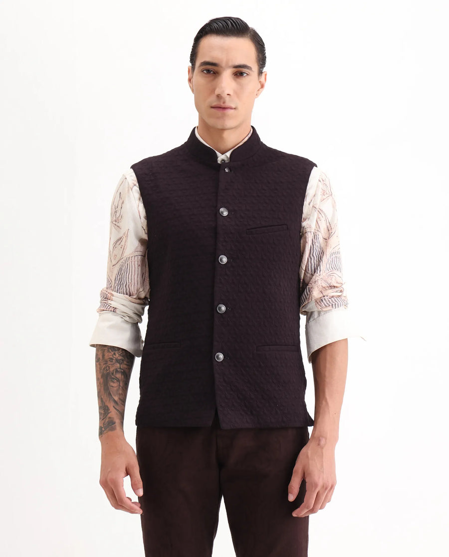 Rare Rabbit Men's Mitzi Dark Maroon Cotton Jacquard Tailored Fit Sleeveless Mandarin Collar Bandhgala Rare Rabbit Men's Lasmos-B1 Beige Viscose Embroidered Regular Fit Sleeveless Mandarin Collar Bandhgala Nehru Jacket