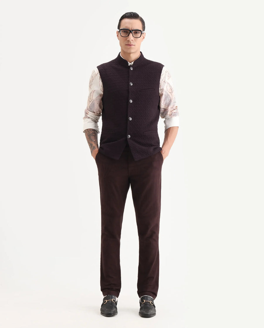 Rare Rabbit Men's Mitzi Dark Maroon Cotton Jacquard Tailored Fit Sleeveless Mandarin Collar Bandhgala Rare Rabbit Men's Lasmos-B1 Beige Viscose Embroidered Regular Fit Sleeveless Mandarin Collar Bandhgala Nehru Jacket