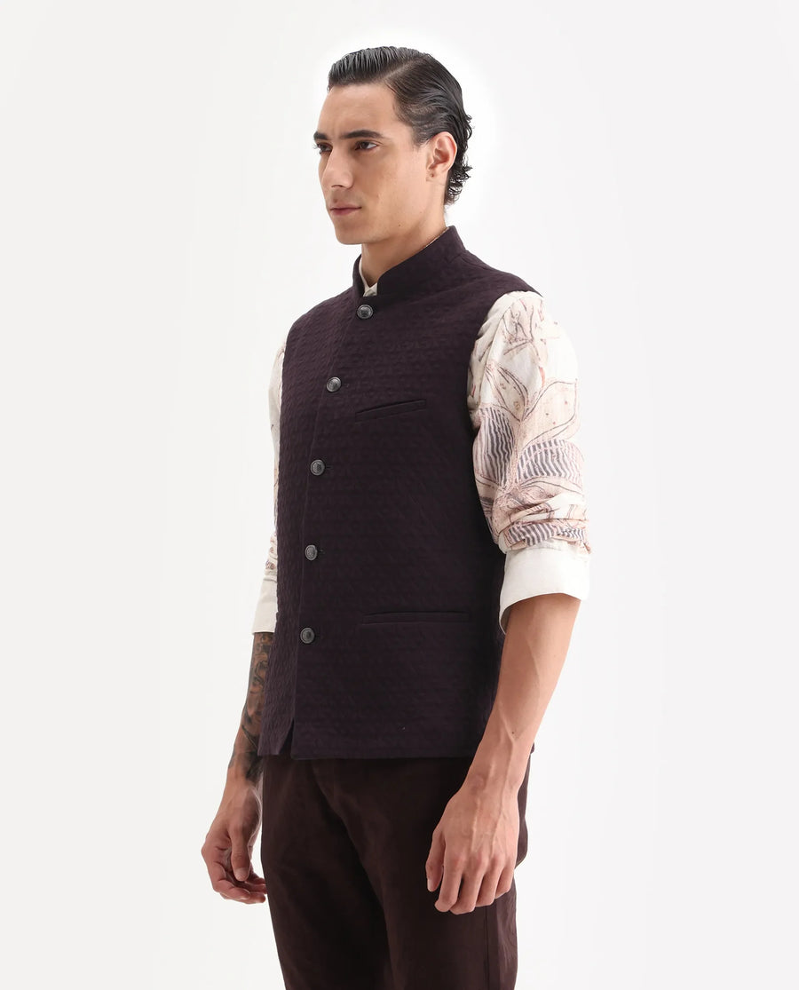 Rare Rabbit Men's Mitzi Dark Maroon Cotton Jacquard Tailored Fit Sleeveless Mandarin Collar Bandhgala Rare Rabbit Men's Lasmos-B1 Beige Viscose Embroidered Regular Fit Sleeveless Mandarin Collar Bandhgala Nehru Jacket