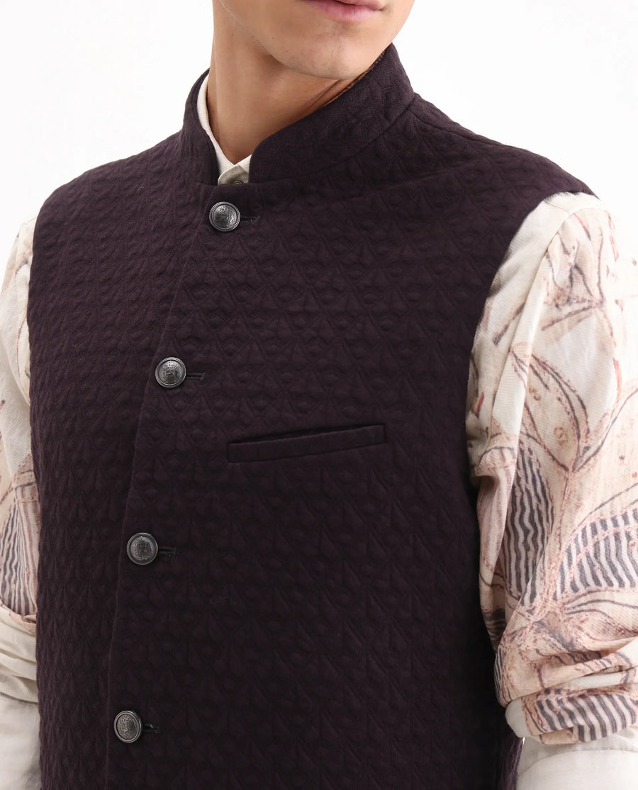 Rare Rabbit Men's Mitzi Dark Maroon Cotton Jacquard Tailored Fit Sleeveless Mandarin Collar Bandhgala Rare Rabbit Men's Lasmos-B1 Beige Viscose Embroidered Regular Fit Sleeveless Mandarin Collar Bandhgala Nehru Jacket