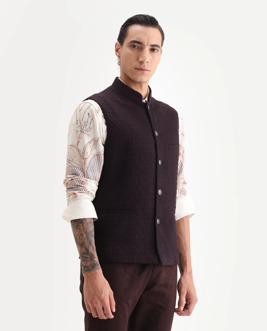 Rare Rabbit Men's Mitzi Dark Maroon Cotton Jacquard Tailored Fit Sleeveless Mandarin Collar Bandhgala Rare Rabbit Men's Lasmos-B1 Beige Viscose Embroidered Regular Fit Sleeveless Mandarin Collar Bandhgala Nehru Jacket