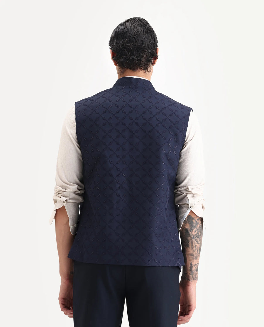 Rare Rabbit Men's Medob Dark Navy Viscose Embroidered Tailored Fit Sleeveless Mandarin Collar Bandhgala Rare Rabbit Men's Lasmos-B1 Beige Viscose Embroidered Regular Fit Sleeveless Mandarin Collar Bandhgala Nehru Jacket
