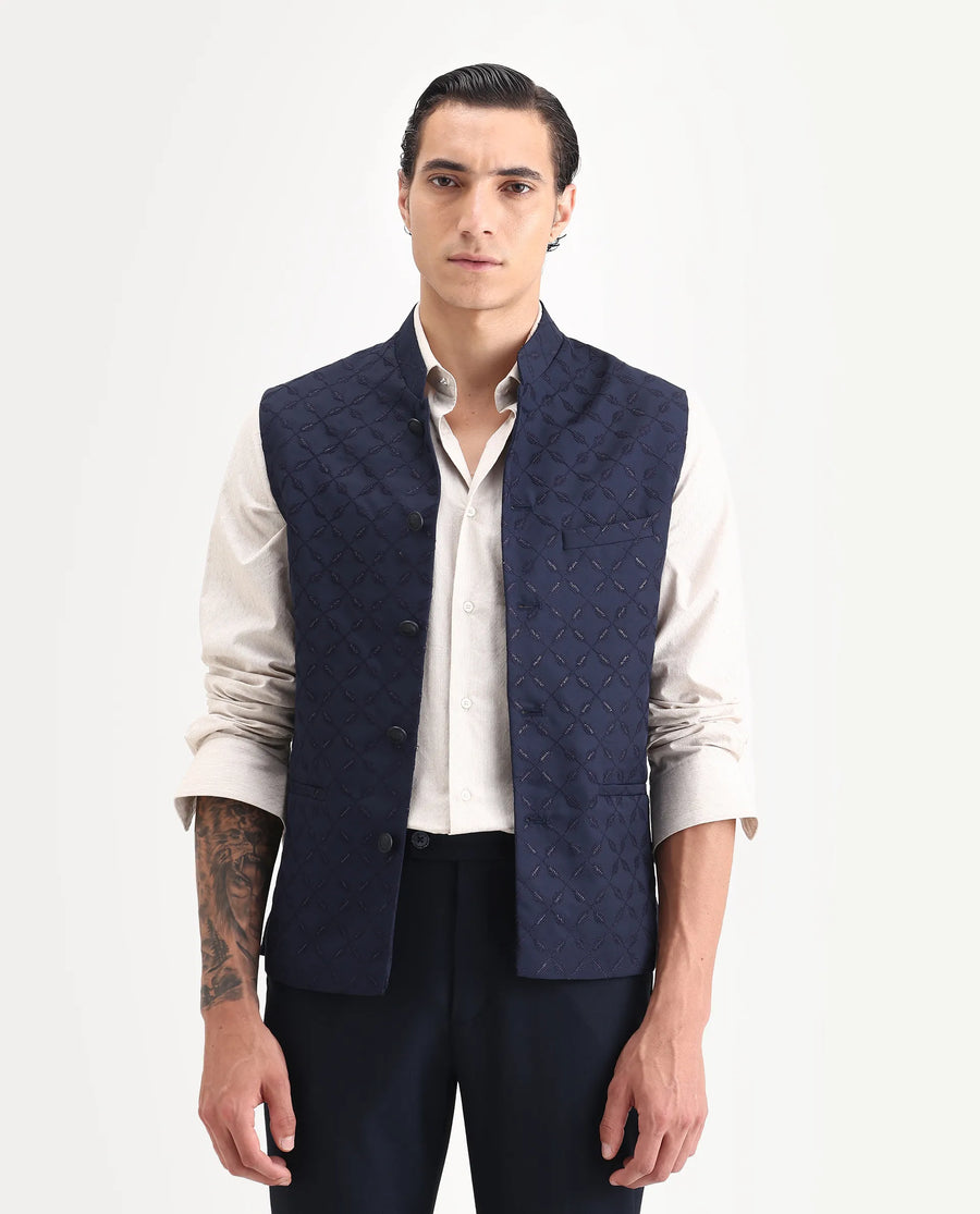 Rare Rabbit Men's Medob Dark Navy Viscose Embroidered Tailored Fit Sleeveless Mandarin Collar Bandhgala Rare Rabbit Men's Lasmos-B1 Beige Viscose Embroidered Regular Fit Sleeveless Mandarin Collar Bandhgala Nehru Jacket