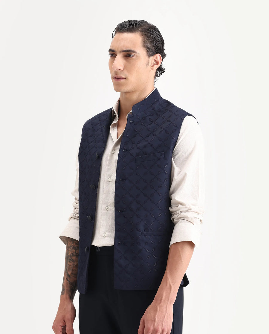 Rare Rabbit Men's Medob Dark Navy Viscose Embroidered Tailored Fit Sleeveless Mandarin Collar Bandhgala Rare Rabbit Men's Lasmos-B1 Beige Viscose Embroidered Regular Fit Sleeveless Mandarin Collar Bandhgala Nehru Jacket