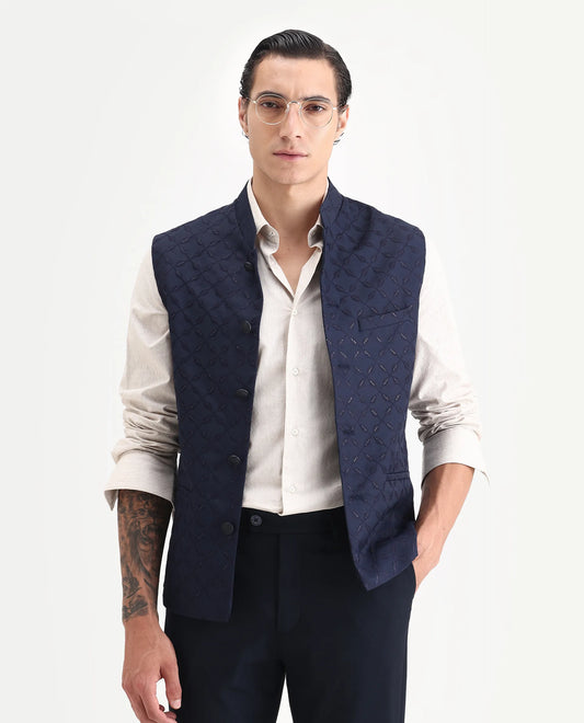 Rare Rabbit Men's Medob Dark Navy Viscose Embroidered Tailored Fit Sleeveless Mandarin Collar Bandhgala Rare Rabbit Men's Lasmos-B1 Beige Viscose Embroidered Regular Fit Sleeveless Mandarin Collar Bandhgala Nehru Jacket