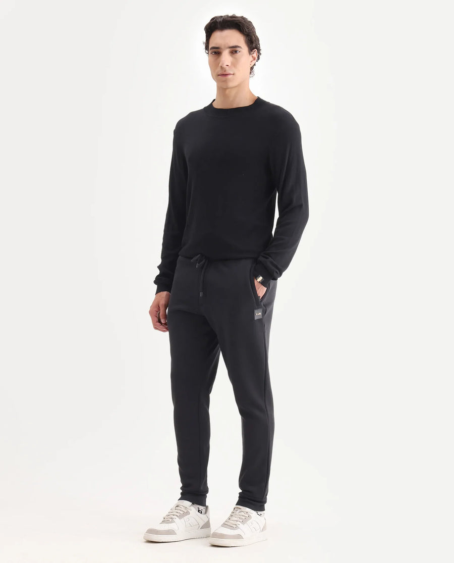 Rare Rabbit Men's Ander Black Cotton Plain Regular Fit Joggers