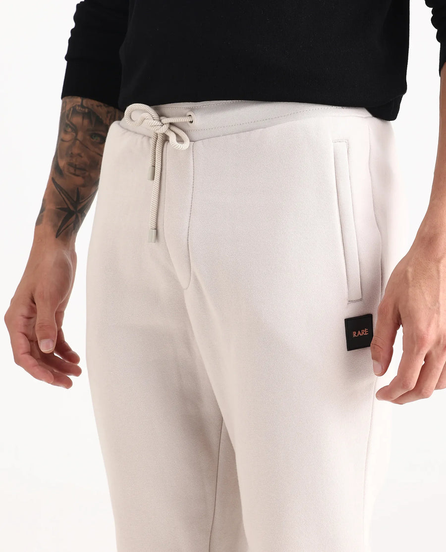 Rare Rabbit Men's Ander Off White Cotton Plain Regular Fit Track Joggers