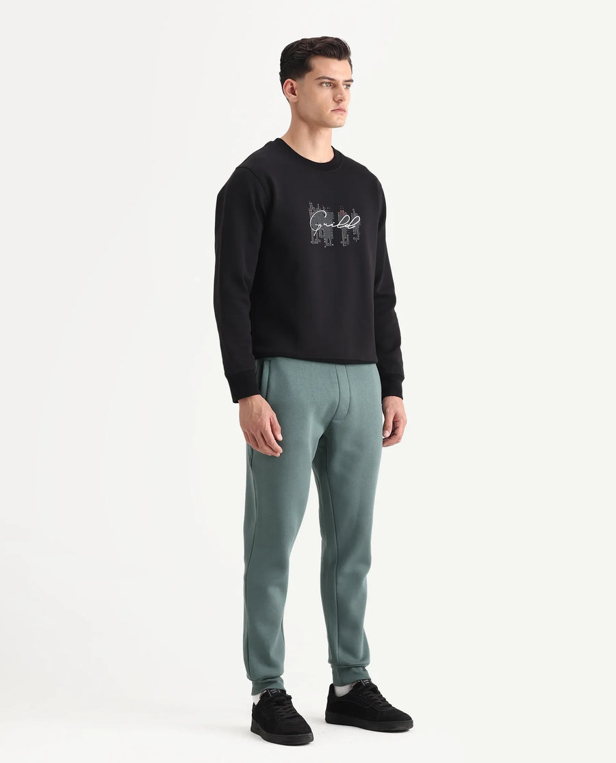 Rare Rabbit Men's Anderson-B25 Dusky Green Cotton Blend Fabric Regular Fit Badge Print Joggers