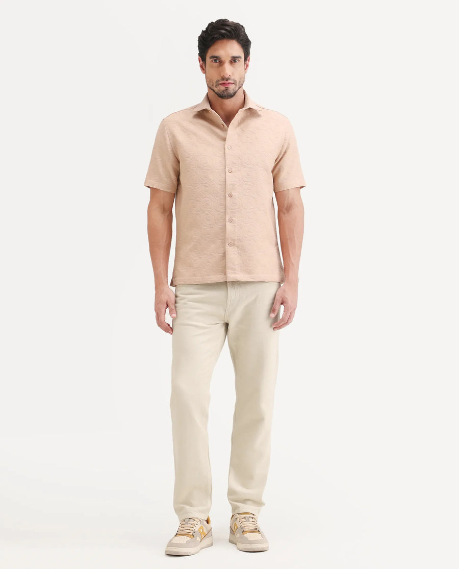 Rare Rabbit Men's Arvi B Beige Cotton Fabric Shank And Zipper Kurt Carrot Plain Jeans
