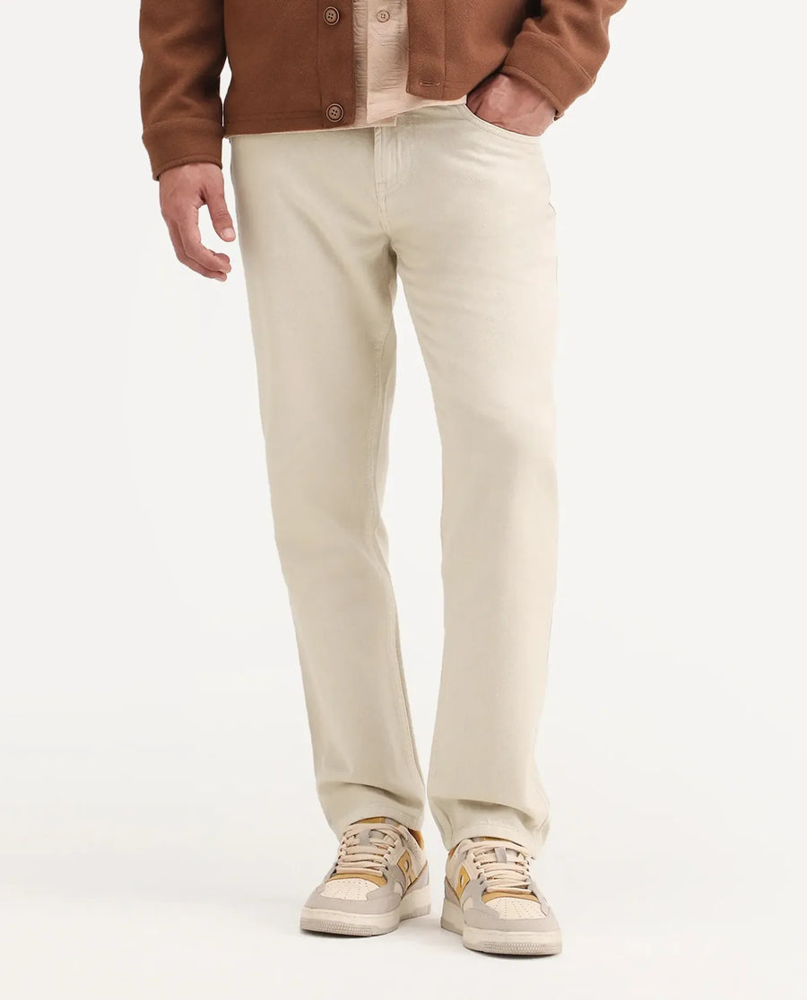 Rare Rabbit Men's Arvi B Beige Cotton Fabric Shank And Zipper Kurt Carrot Plain Jeans