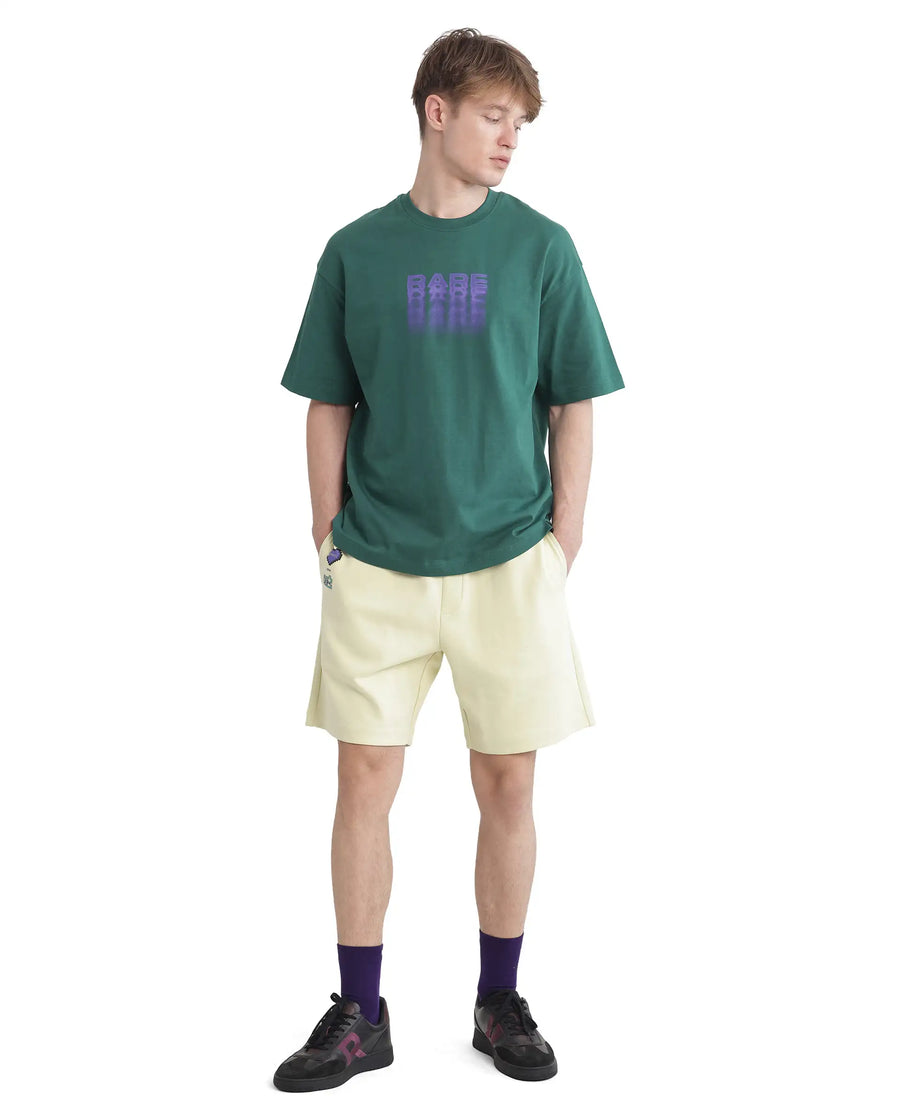 Rare Rabbit Men's Act Dark Green Cotton Graphic Print Oversized Fit Half Sleeve Crew Neck T-Shirt