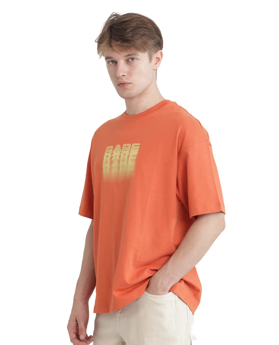 Rare Rabbit Men's Act Orange Cotton Graphic Print Oversized Fit Half Sleeve Crew Neck T-Shirt