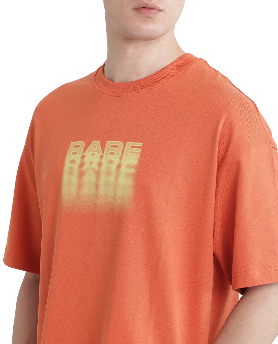 Rare Rabbit Men's Act Orange Cotton Graphic Print Oversized Fit Half Sleeve Crew Neck T-Shirt