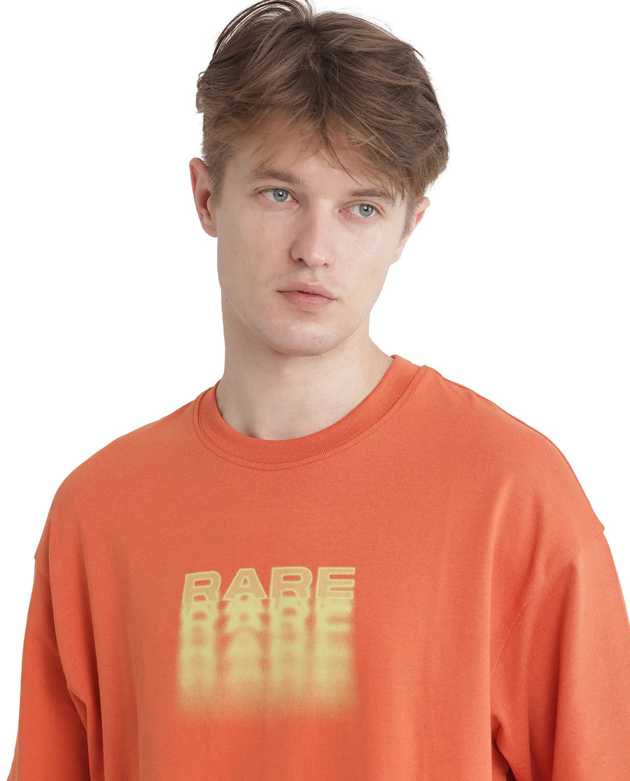 Rare Rabbit Men's Act Orange Cotton Graphic Print Oversized Fit Half Sleeve Crew Neck T-Shirt