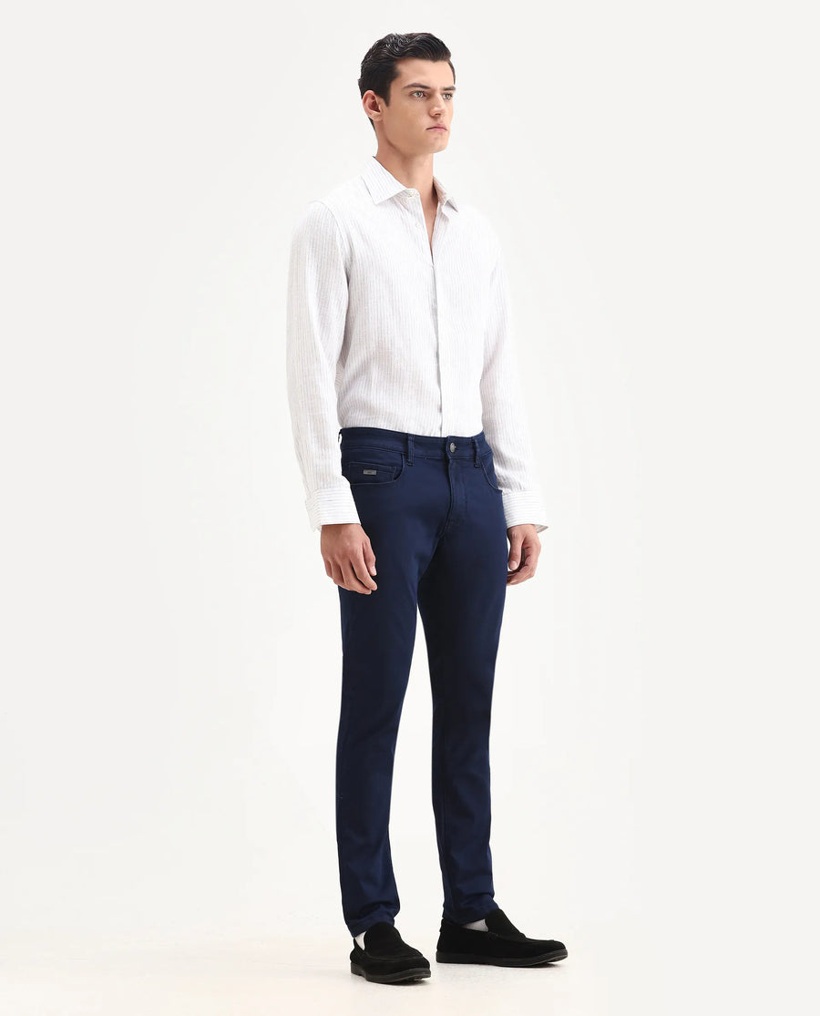 Rare Rabbit Men's Corvo Blue Cotton Blend Plain Hawk Slim Fit Jeans