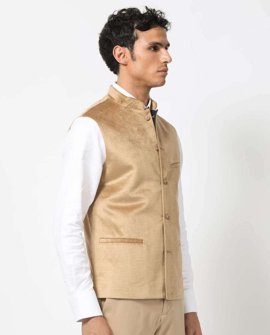 Rare Rabbit Men's Emerald Light Beige Polyester Plain Tailored Fit Sleeveless Mandarin Collar Bandhgala Rare Rabbit Men's Lasmos-B1 Beige Viscose Embroidered Regular Fit Sleeveless Mandarin Collar Bandhgala Nehru Jacket