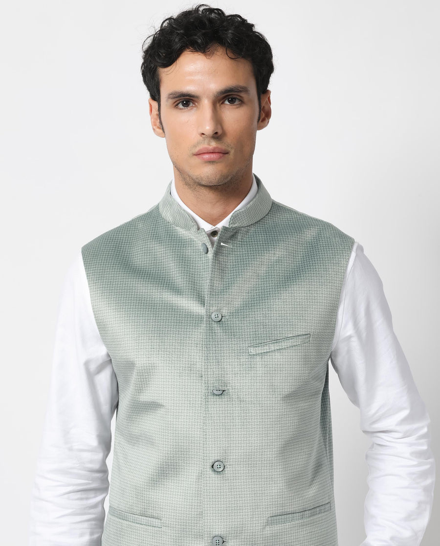 Rare Rabbit Men's Emerald Light Blue Polyester Plain Tailored Fit Sleeveless Mandarin Collar Bandhgala Rare Rabbit Men's Lasmos-B1 Beige Viscose Embroidered Regular Fit Sleeveless Mandarin Collar Bandhgala Nehru Jacket