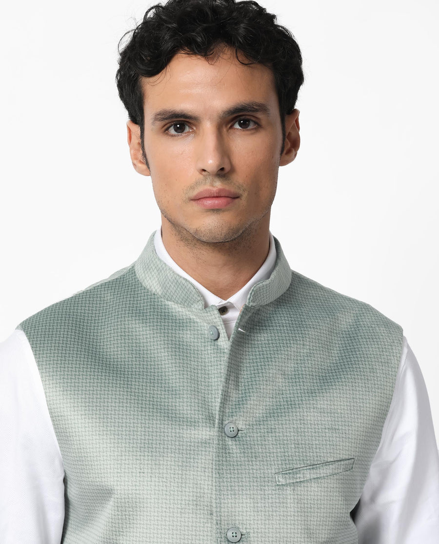 Rare Rabbit Men's Emerald Light Blue Polyester Plain Tailored Fit Sleeveless Mandarin Collar Bandhgala Rare Rabbit Men's Lasmos-B1 Beige Viscose Embroidered Regular Fit Sleeveless Mandarin Collar Bandhgala Nehru Jacket