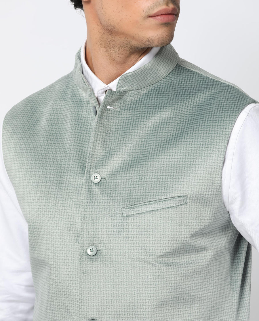 Rare Rabbit Men's Emerald Light Blue Polyester Plain Tailored Fit Sleeveless Mandarin Collar Bandhgala Rare Rabbit Men's Lasmos-B1 Beige Viscose Embroidered Regular Fit Sleeveless Mandarin Collar Bandhgala Nehru Jacket