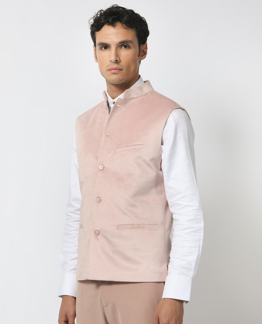 Rare Rabbit Men's Emerald Light Pink Polyester Plain Tailored Fit Sleeveless Mandarin Collar Bandhgala Rare Rabbit Men's Lasmos-B1 Beige Viscose Embroidered Regular Fit Sleeveless Mandarin Collar Bandhgala Nehru Jacket
