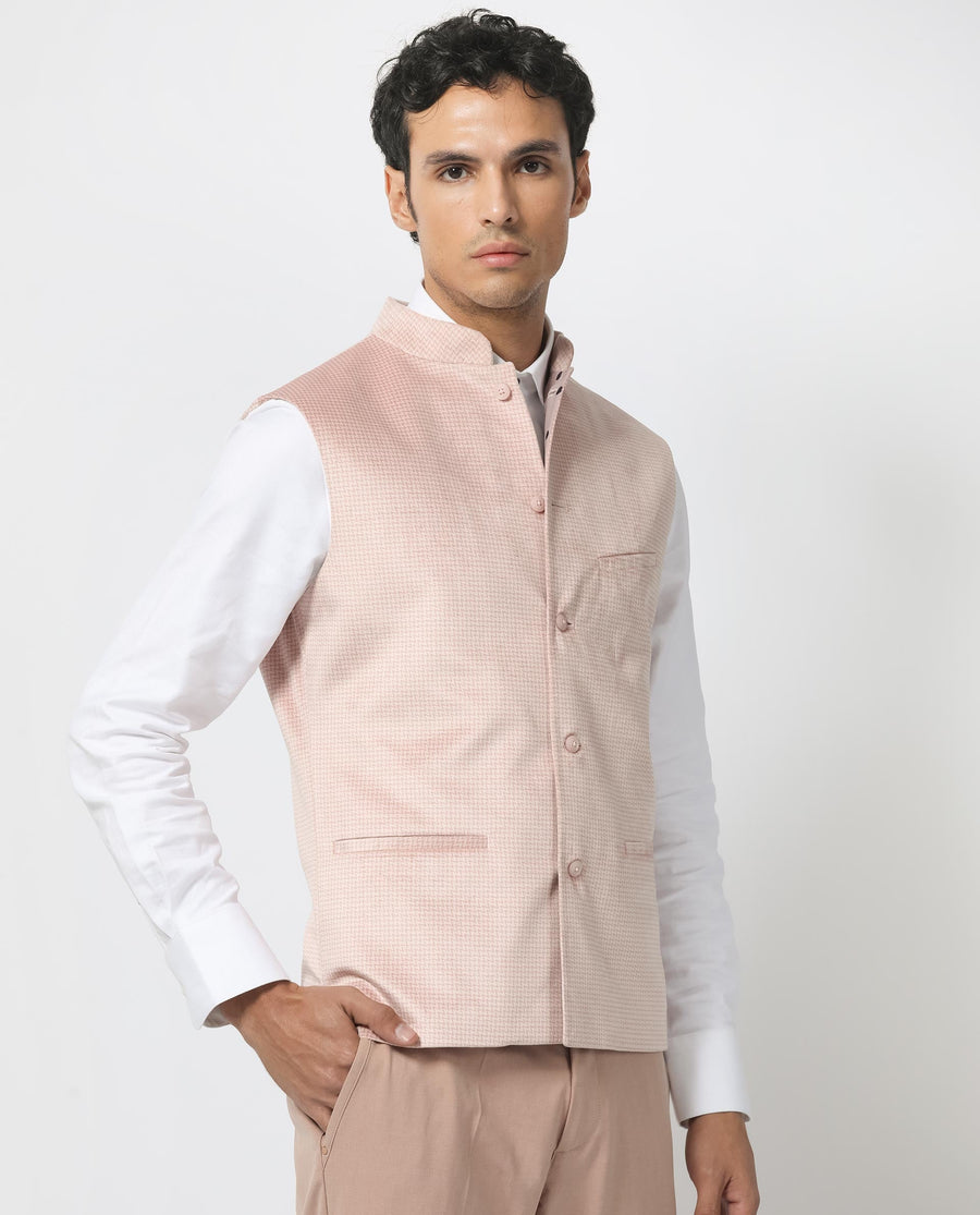 Rare Rabbit Men's Emerald Light Pink Polyester Plain Tailored Fit Sleeveless Mandarin Collar Bandhgala Rare Rabbit Men's Lasmos-B1 Beige Viscose Embroidered Regular Fit Sleeveless Mandarin Collar Bandhgala Nehru Jacket