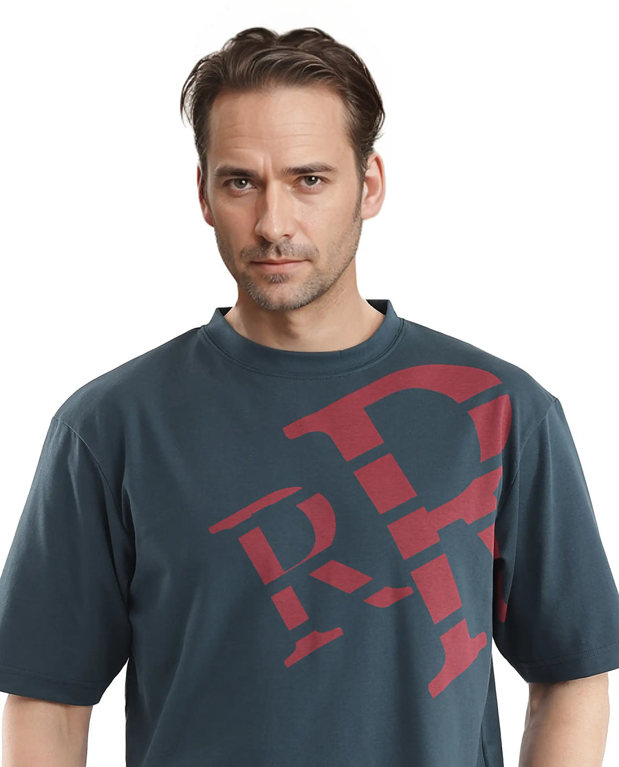 Rare Rabbit Men's Feat Teal Cotton Graphic Print Oversized Fit Half Sleeve Crew Neck T-Shirt
