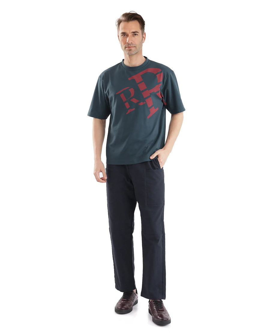 Rare Rabbit Men's Feat Teal Cotton Graphic Print Oversized Fit Half Sleeve Crew Neck T-Shirt