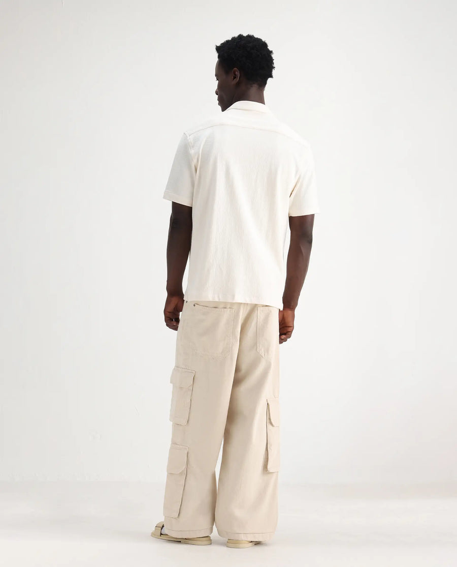 Rare Rabbit Men's Freks Beige Cotton Plain Baggy Fit Jeans
