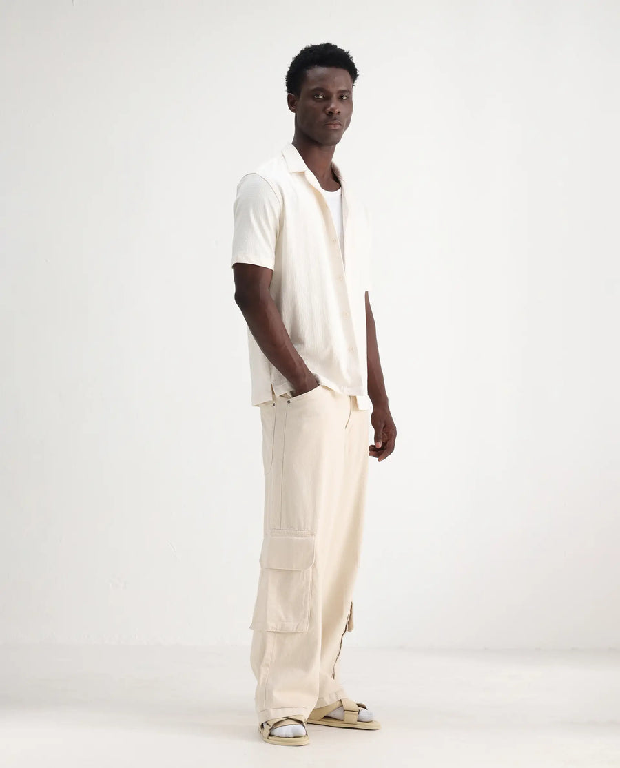 Rare Rabbit Men's Freks Beige Cotton Plain Baggy Fit Jeans
