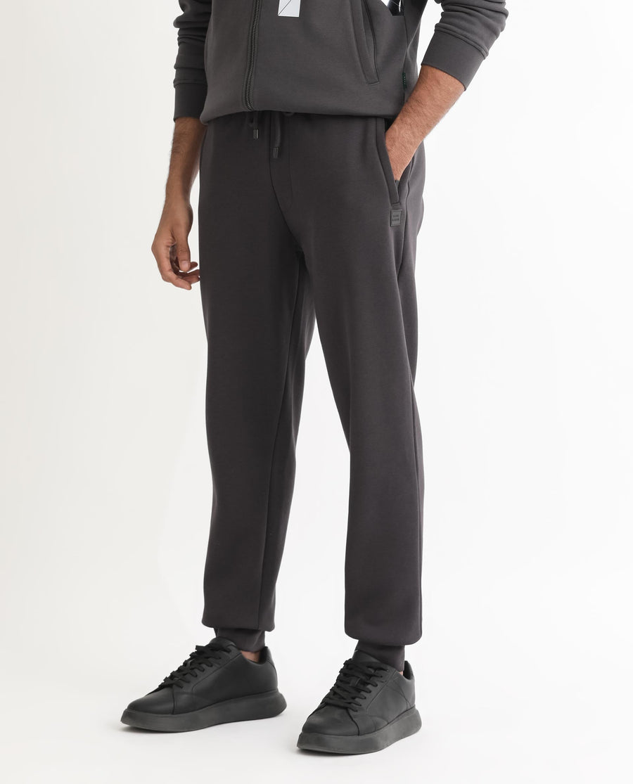 Rare Rabbit Men's Helna Dark Grey Cotton Plain Regular Fit Joggers