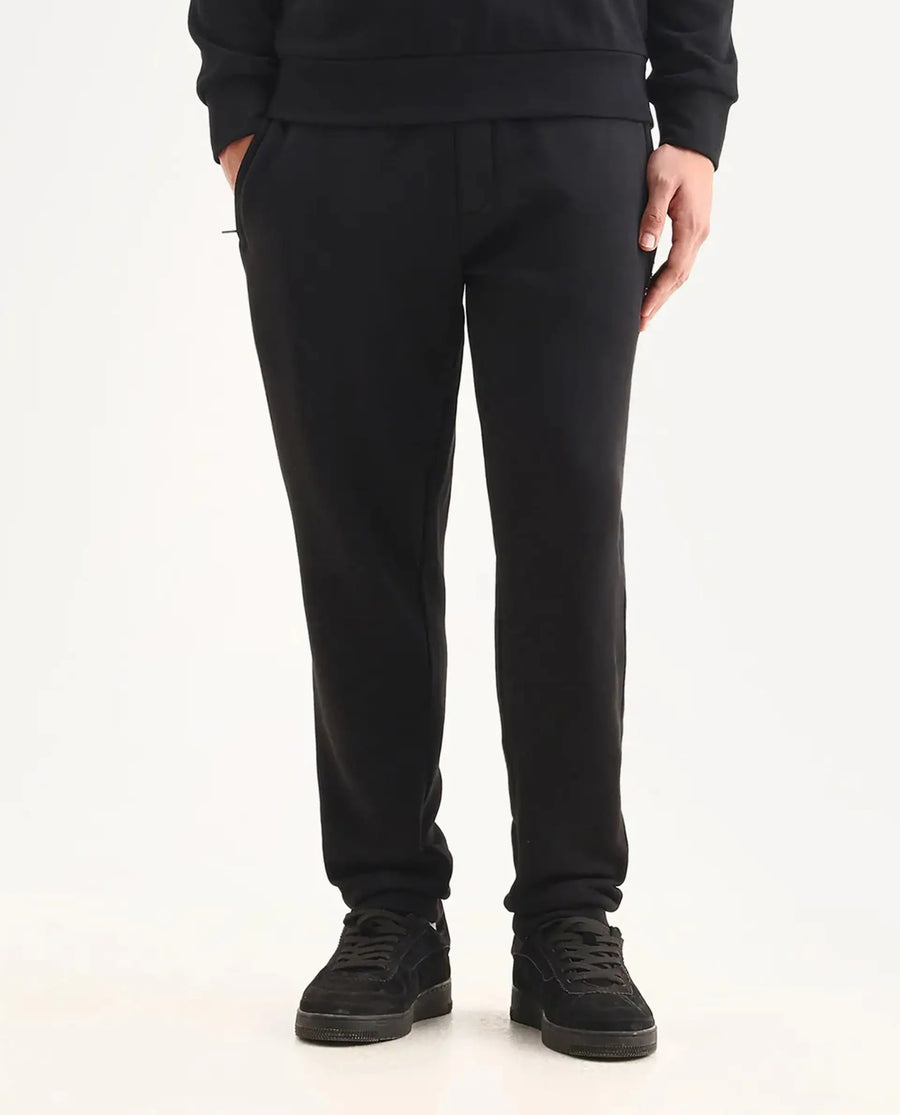 Rare Rabbit Men's Anderson-B25 Black Cotton Blend Fabric Badge Print Joggers