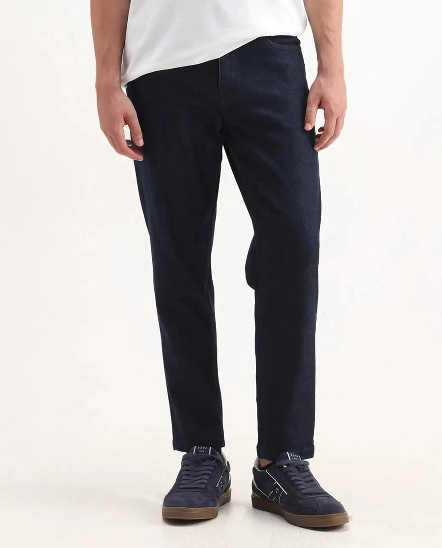 Rare Rabbit Men's Sam Dark Blue Cotton Plain Kurt Carrot Fit Jeans