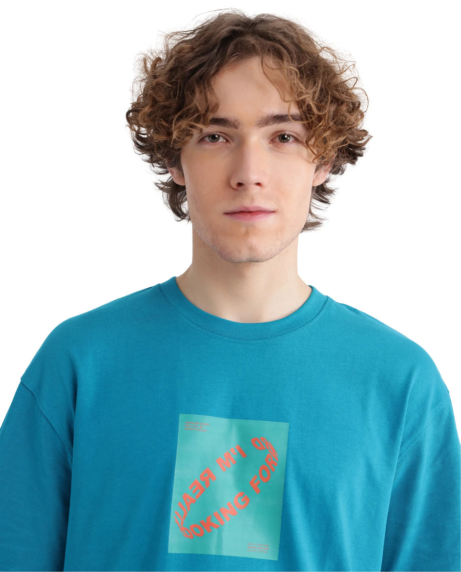 Rare Rabbit Men's Just Teal Cotton Graphic Print Boxy Fit Half Sleeve Crew Neck T-Shirt