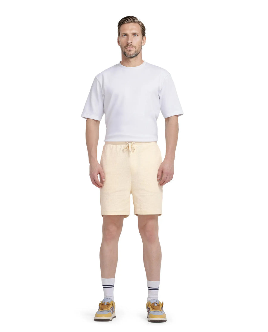 Rare Rabbit Men's Kelor Pastel Yellow Cotton Blend Plain Regular Fit Shorts