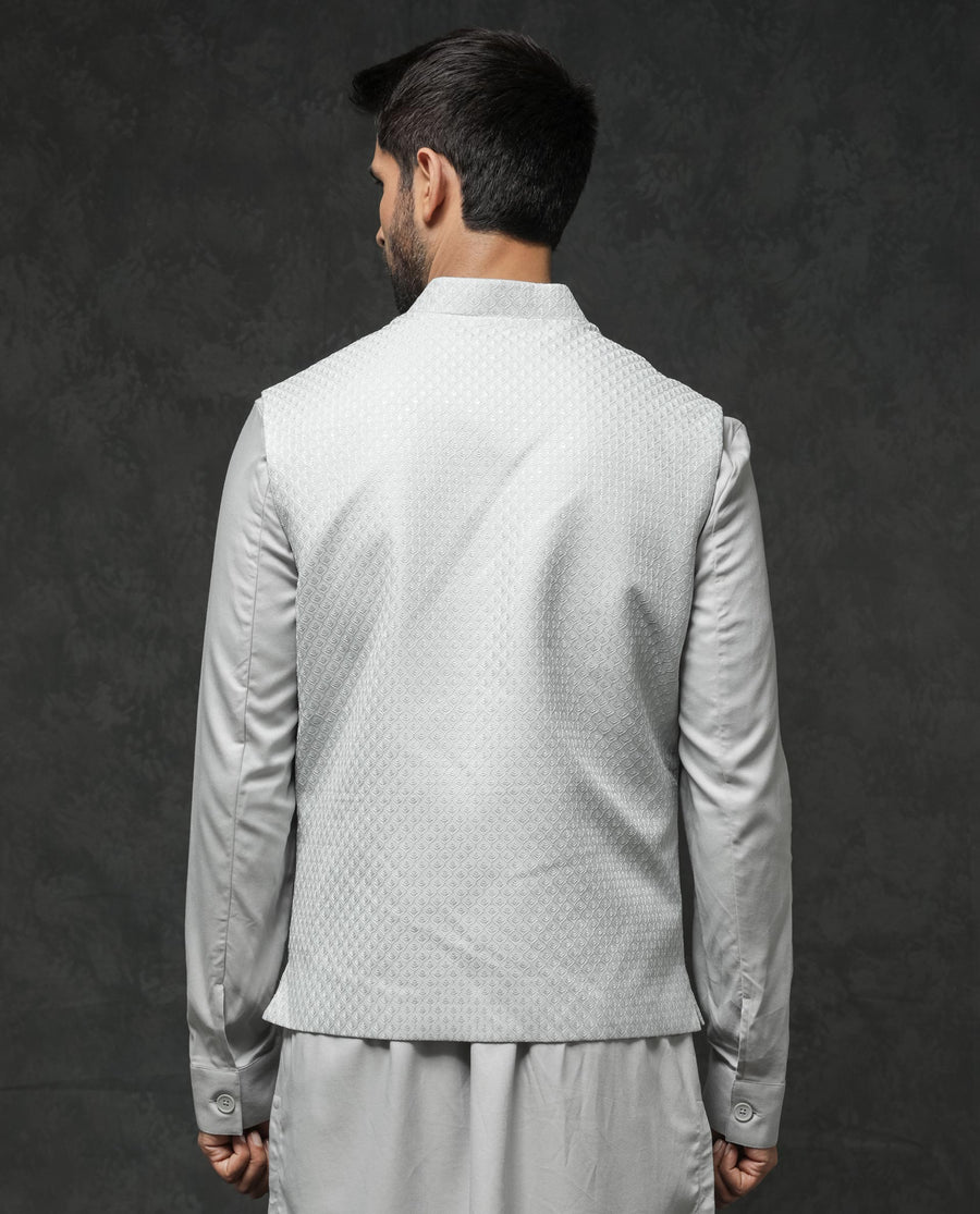 Rare Rabbit Men's Guild Festive Lasmos B1 Light Grey Viscose Embroidered Regular Fit Sleeveless Mandarin Collar Bandhgala Rare Rabbit Men's Lasmos-B1 Beige Viscose Embroidered Regular Fit Sleeveless Mandarin Collar Bandhgala Nehru Jacket