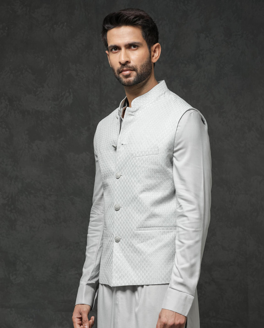 Rare Rabbit Men's Guild Festive Lasmos B1 Light Grey Viscose Embroidered Regular Fit Sleeveless Mandarin Collar Bandhgala Rare Rabbit Men's Lasmos-B1 Beige Viscose Embroidered Regular Fit Sleeveless Mandarin Collar Bandhgala Nehru Jacket