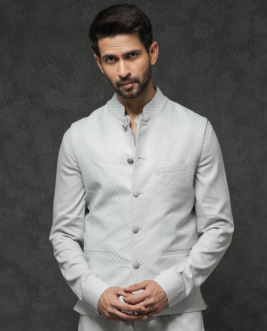 Rare Rabbit Men's Guild Festive Lasmos B1 Light Grey Viscose Embroidered Regular Fit Sleeveless Mandarin Collar Bandhgala Rare Rabbit Men's Lasmos-B1 Beige Viscose Embroidered Regular Fit Sleeveless Mandarin Collar Bandhgala Nehru Jacket