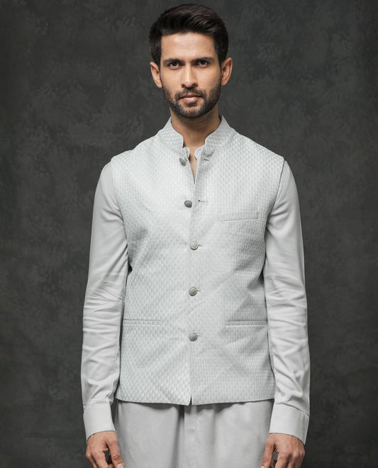 Rare Rabbit Men's Guild Festive Lasmos B1 Light Grey Viscose Embroidered Regular Fit Sleeveless Mandarin Collar Bandhgala Rare Rabbit Men's Lasmos-B1 Beige Viscose Embroidered Regular Fit Sleeveless Mandarin Collar Bandhgala Nehru Jacket