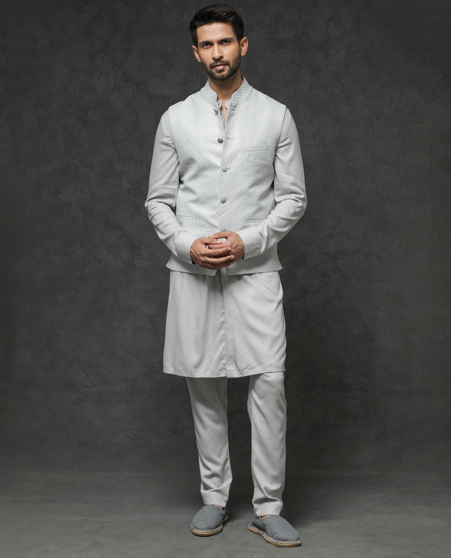 Rare Rabbit Men's Guild Festive Lasmos B1 Light Grey Viscose Embroidered Regular Fit Sleeveless Mandarin Collar Bandhgala Rare Rabbit Men's Lasmos-B1 Beige Viscose Embroidered Regular Fit Sleeveless Mandarin Collar Bandhgala Nehru Jacket