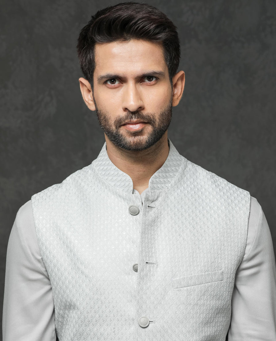 Rare Rabbit Men's Guild Festive Lasmos B1 Light Grey Viscose Embroidered Regular Fit Sleeveless Mandarin Collar Bandhgala Rare Rabbit Men's Lasmos-B1 Beige Viscose Embroidered Regular Fit Sleeveless Mandarin Collar Bandhgala Nehru Jacket