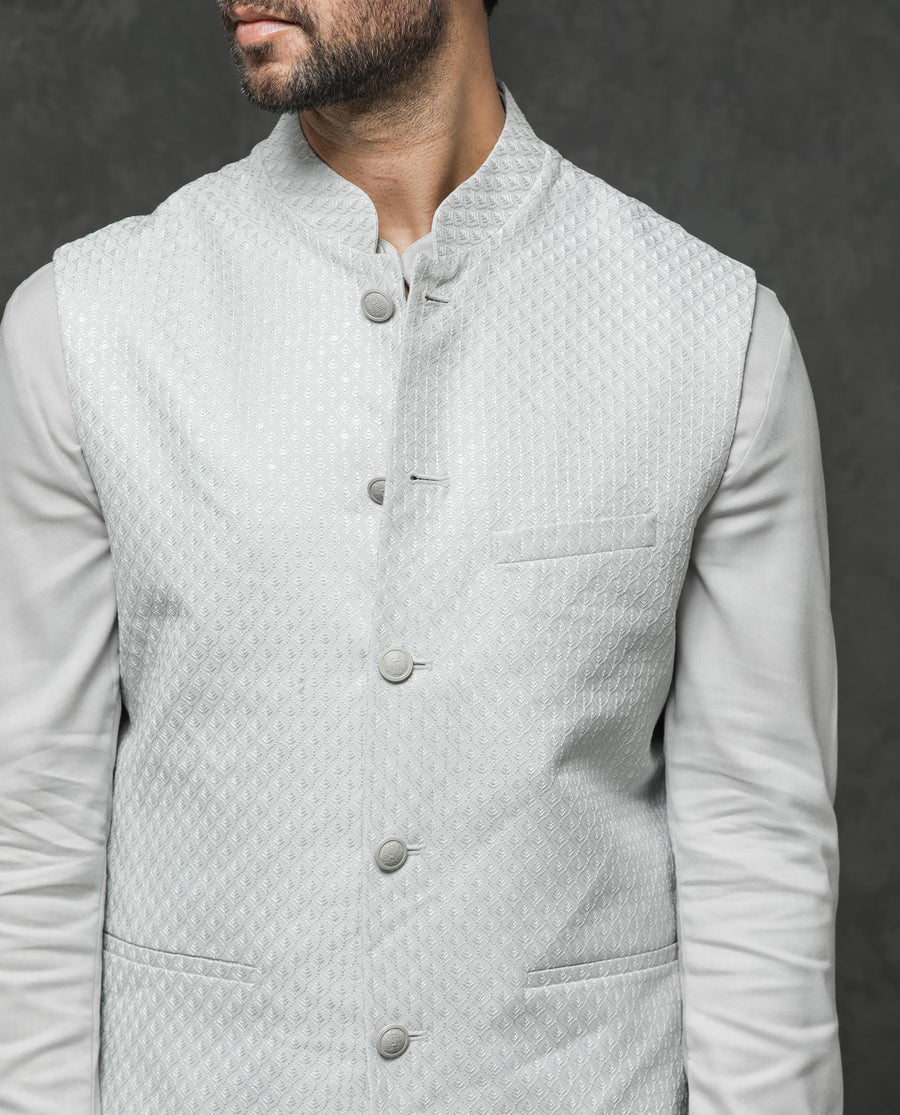 Rare Rabbit Men's Guild Festive Lasmos B1 Light Grey Viscose Embroidered Regular Fit Sleeveless Mandarin Collar Bandhgala Rare Rabbit Men's Lasmos-B1 Beige Viscose Embroidered Regular Fit Sleeveless Mandarin Collar Bandhgala Nehru Jacket