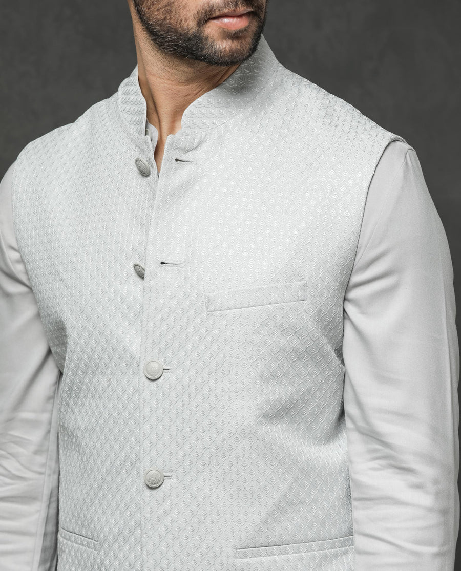 Rare Rabbit Men's Guild Festive Lasmos B1 Light Grey Viscose Embroidered Regular Fit Sleeveless Mandarin Collar Bandhgala Rare Rabbit Men's Lasmos-B1 Beige Viscose Embroidered Regular Fit Sleeveless Mandarin Collar Bandhgala Nehru Jacket