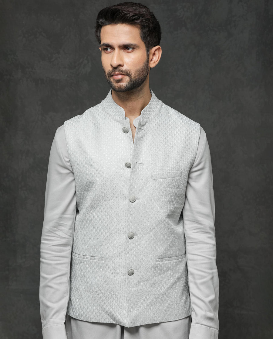 Rare Rabbit Men's Guild Festive Lasmos B1 Light Grey Viscose Embroidered Regular Fit Sleeveless Mandarin Collar Bandhgala Rare Rabbit Men's Lasmos-B1 Beige Viscose Embroidered Regular Fit Sleeveless Mandarin Collar Bandhgala Nehru Jacket
