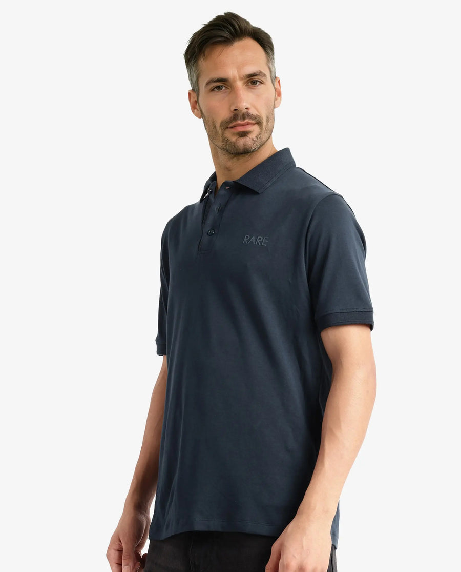 Rare Rabbit Men's Laur Dark Green Cotton Plain Regular Fit Half Sleeve Polo