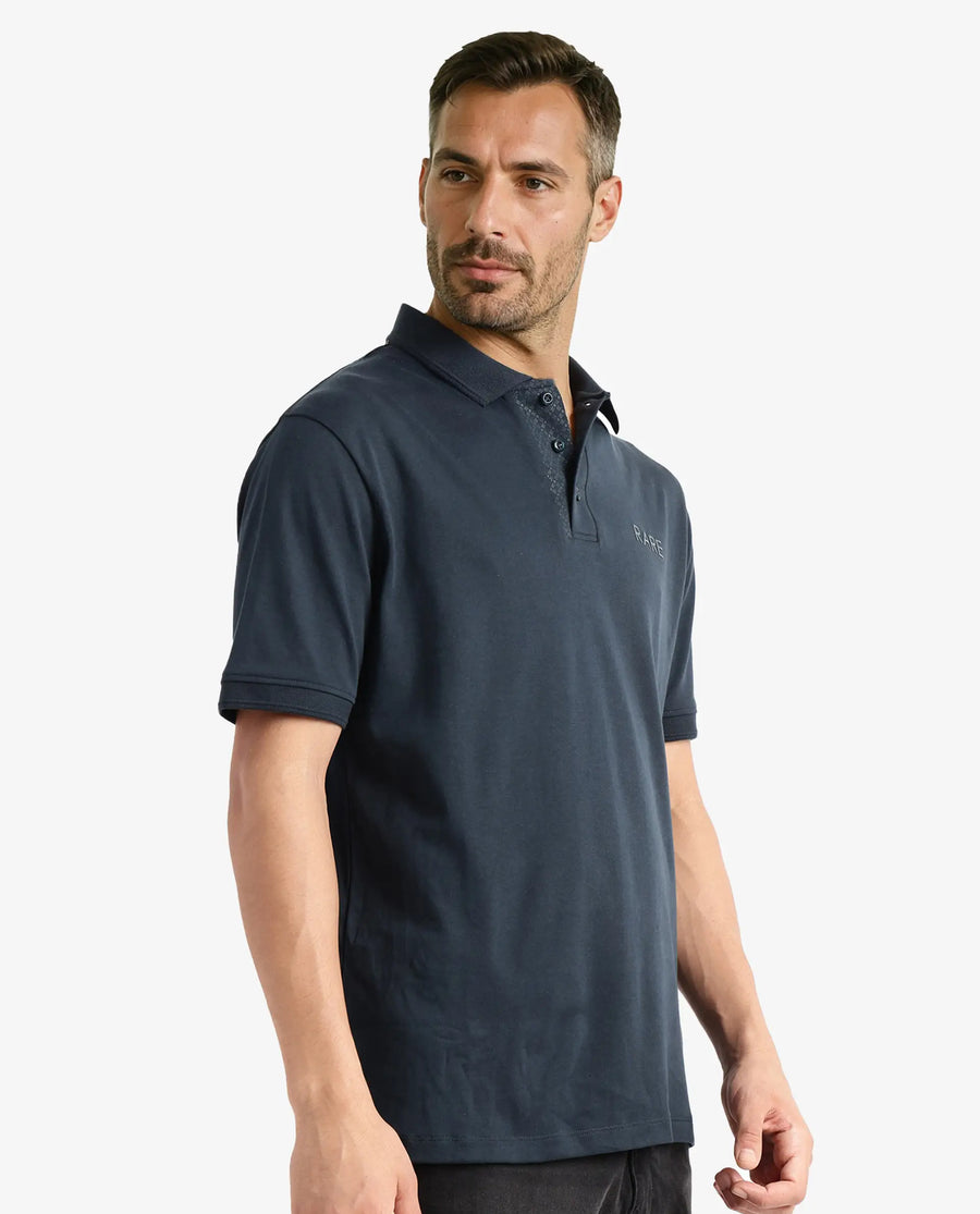 Rare Rabbit Men's Laur Dark Green Cotton Plain Regular Fit Half Sleeve Polo